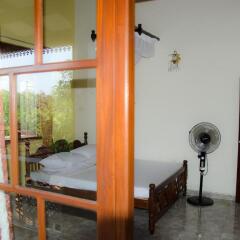 Отель Nikini Homestay Стандартный номер с различными типами кроватей фото 3