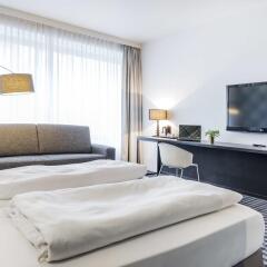 Отель PREMIER SUITES PLUS Antwerp комната для гостей фото 6