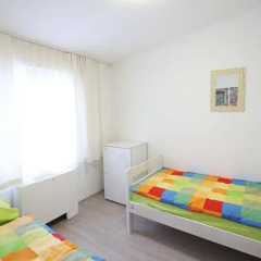 Pozitiv Hostel Стандартный номер с 2 отдельными кроватями (общая ванная комната) фото 4