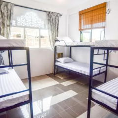 Отель M Home Guest House Кровать в общем номере с двухъярусной кроватью