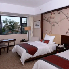 Guangdong Yingbin Hotel 4* Улучшенный номер с 2 отдельными кроватями фото 4