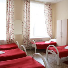 Хостел Ромашка Кровать в общем номере с двухъярусной кроватью