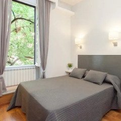 Отель AmoRoma Suite Стандартный номер с двуспальной кроватью фото 6