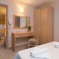 Отель Mary's Residence Suites удобства в номере