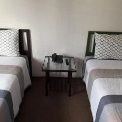 Отель Honduras Executive Inn at Palmira Гондурас, Тегусигальпа - отзывы, цены и фото номеров - забронировать отель Honduras Executive Inn at Palmira онлайн комната для гостей
