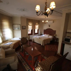 Апартаменты Tashkonak Sultan Suites and Apartments Люкс с различными типами кроватей фото 3