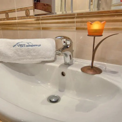 Отель VISITzakopane Rainbow Apartments Польша, Закопане - отзывы, цены и фото номеров - забронировать отель VISITzakopane Rainbow Apartments онлайн ванная фото 2