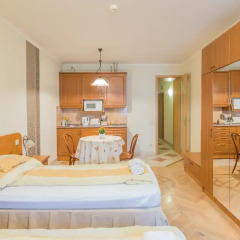 Апартаменты Kalvin Apartments комната для гостей фото 2