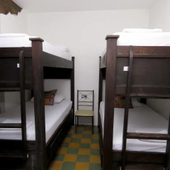 Отель Hostal Pajara Pinta Кровать в общем номере с двухъярусной кроватью фото 7