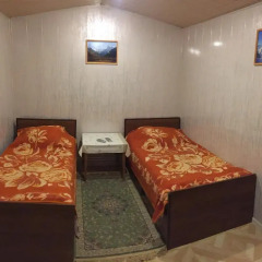 Гостиница Гостевой Дом Пихтовый Мыс на Домбае отзывы, цены и фото номеров - забронировать гостиницу Гостевой Дом Пихтовый Мыс онлайн Домбай комната для гостей фото 4
