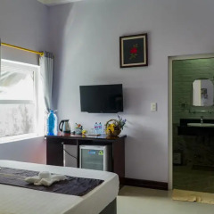 Отель The Moon Villa Hoi An 2* Стандартный семейный номер с различными типами кроватей фото 23