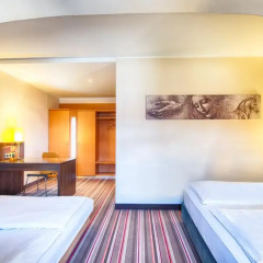 Отель Leonardo Hotel & Residenz München Германия, Мюнхен - 11 отзывов об отеле, цены и фото номеров - забронировать отель Leonardo Hotel & Residenz München онлайн комната для гостей фото 5
