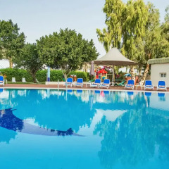 Отель Holiday International Sharjah бассейн фото 3
