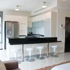Апартаменты Ziv Apartments 8 Amos Street Тель-Авив в номере