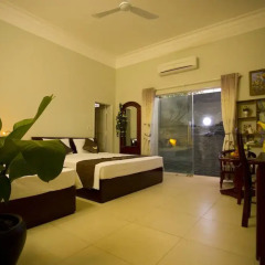 Отель The Moon Villa Hoi An 2* Стандартный семейный номер с различными типами кроватей фото 20