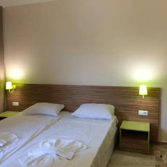 TM Deluxe Hotel комната для гостей фото 3