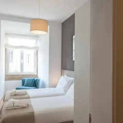 Отель Feels Like Home Rossio Prime Suites 4* Стандартный номер с 2 отдельными кроватями (общая ванная комната) фото 24