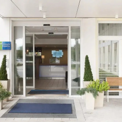 Отель Holiday Inn Express Munich Airport 3* Стандартный номер с различными типами кроватей фото 3