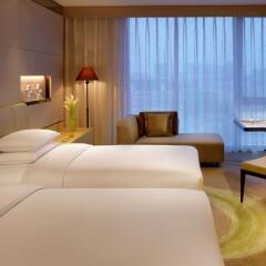 Отель Hyatt Regency Tianjin East 4* Стандартный номер с различными типами кроватей фото 4