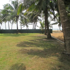 Отель Villa Whispering Shells пляж