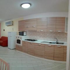 Отель Attico Bella Vista Синискола в номере фото 2