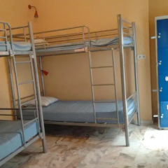 Отель Triana Backpackers 2* Кровать в общем номере с двухъярусной кроватью фото 5
