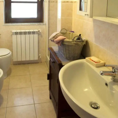 Отель La Casa Sul Fiume Сарцана ванная