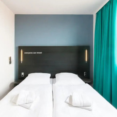 Отель A&O Prague Rhea 3* Стандартный номер с 2 отдельными кроватями фото 2