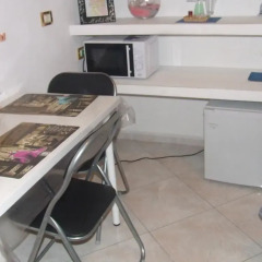 Отель Pinotta's House в номере
