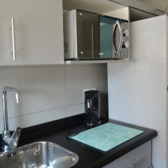 Отель Departamentos Santiago Galeria Sunset Апартаменты с различными типами кроватей фото 9