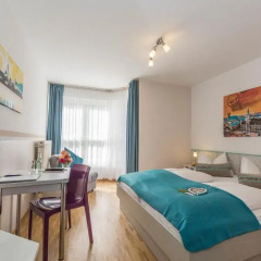 Hotel Amenity München комната для гостей