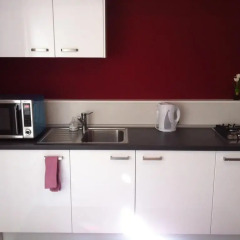 Апартаменты City Center Apartment в номере