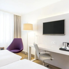 Отель NH Collection Berlin Mitte Am Checkpoint Charlie 4* Улучшенный номер с разными типами кроватей фото 3