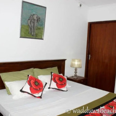 Отель Wadduwa Beach Villa 3* Вилла с различными типами кроватей фото 13