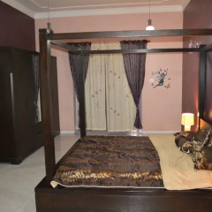 Отель Master Bedroom Al Nokhtha Street Апартаменты с различными типами кроватей