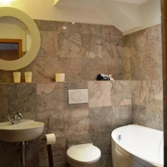Отель Olives Ruterra Loft with Sauna ванная