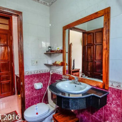 Отель Nhi Nhi 3* Номер Делюкс фото 11