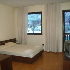 Апартаменты Ski & Holiday Self Catering Apartments Fortuna Банско комната для гостей фото 4