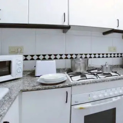 Апартаменты Alguera Apartments Napols в номере
