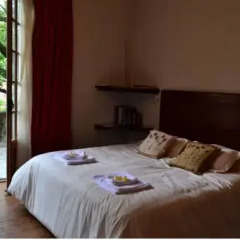 Отель El Capricho del Tigre Bed & Breakfast Тигре комната для гостей фото 5