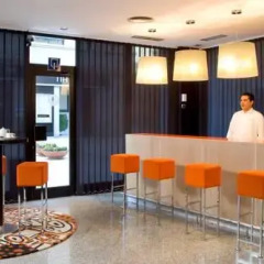 NH Suites Prisma Hotel интерьер отеля