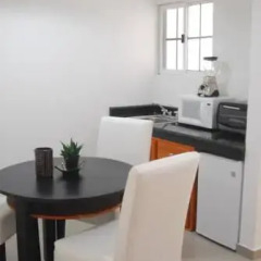 Hotel Casa del Arbol Galerias в номере