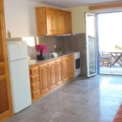 Апартаменты Karterados Beach Apartments в номере