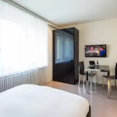 Апартаменты Business Y Holiday Apartments Zürich Цюрих комната для гостей фото 2
