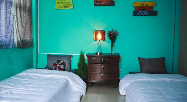 Кровать в общем номере Deja Vu Homestay