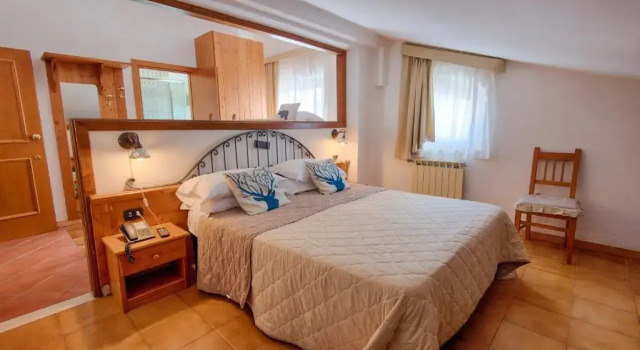 Четырёхместный номер Standard Мансарда Hotel Iris