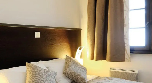Кровать в общем номере Résidence Lagrange Vacances Les Fermes Emiguy
