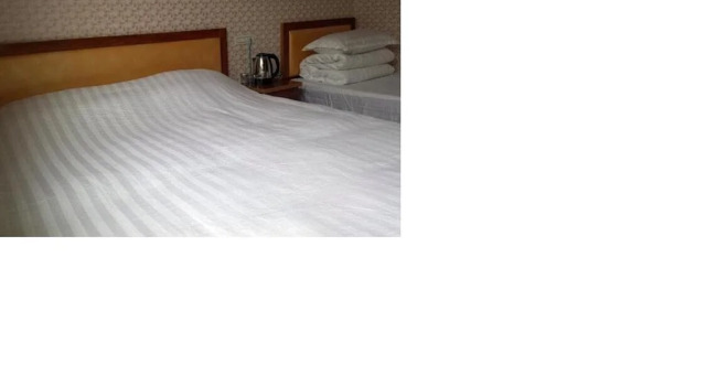 Guyuexuan Inn, Rezerwuj Hotel Hotele w Jinzhong z parkingiem, Parking