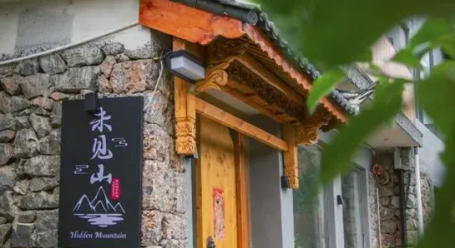 Weijianshan Homestay, Prenota Hotel Hotel a Lijiang con parcheggio, Parcheggio