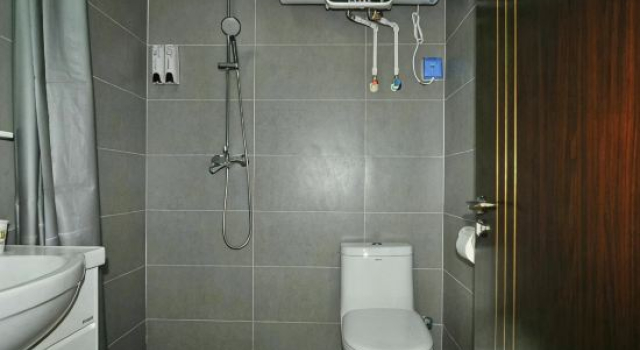Кровать в общем номере (женский номер) Xiaolaohu Homestay (Shenyang Sports College)